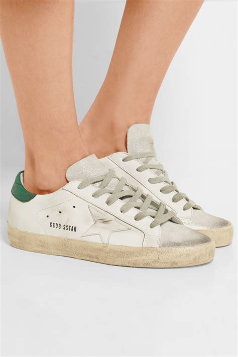 golden goose superstar suede sneakers.